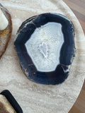 This crystal slab features mesmerizing bands of soft sky blue, deep ocean tones, and natural white veining.