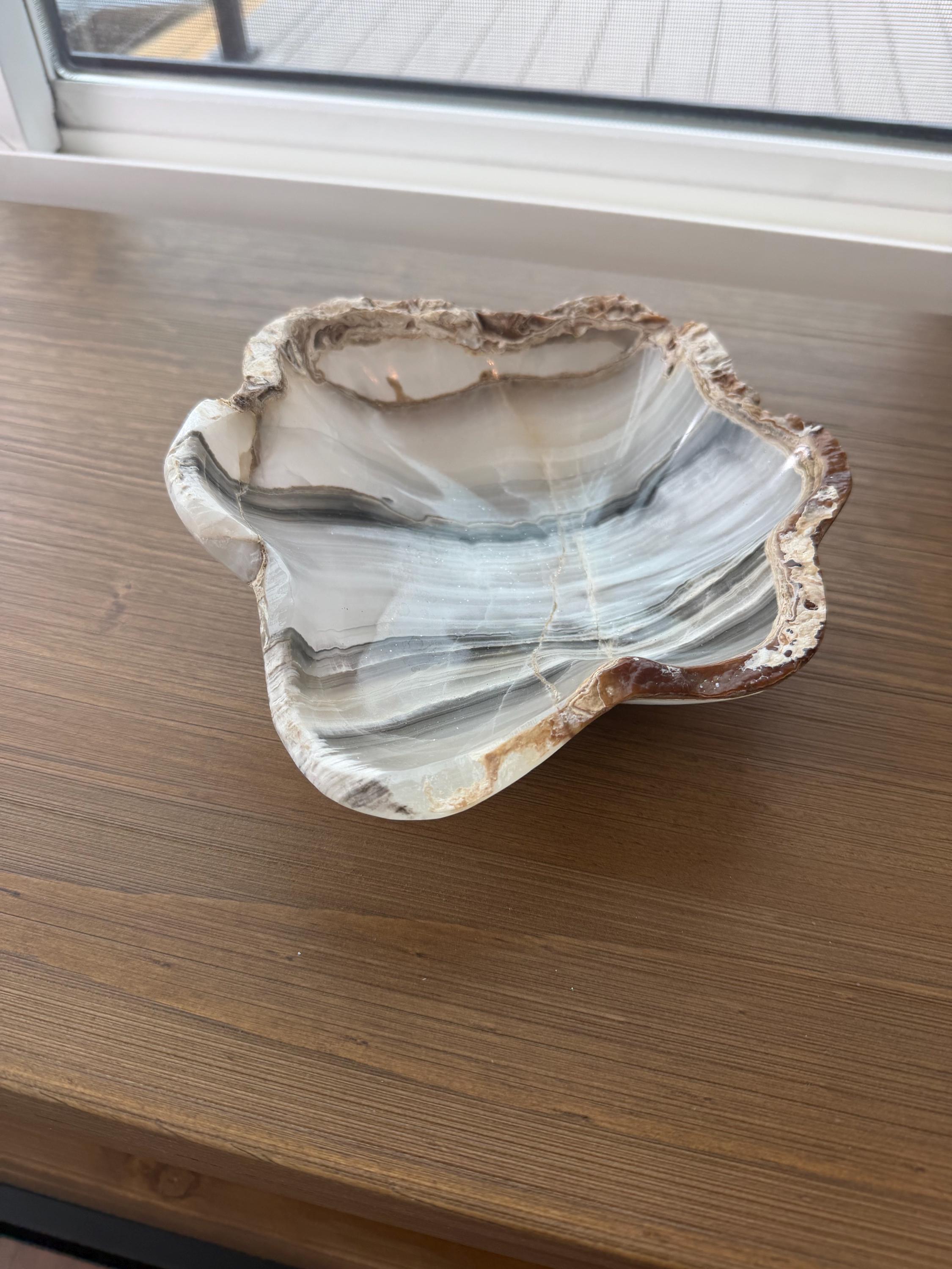 One of a kind pearlescent decorative onyx bowls.