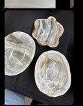 One of a kind pearlescent decorative onyx bowls.